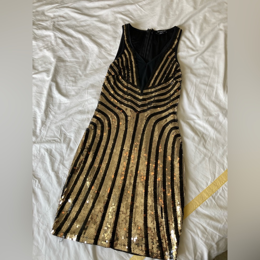 Bebe petty dress - size small with gold and black sequins and mesh.